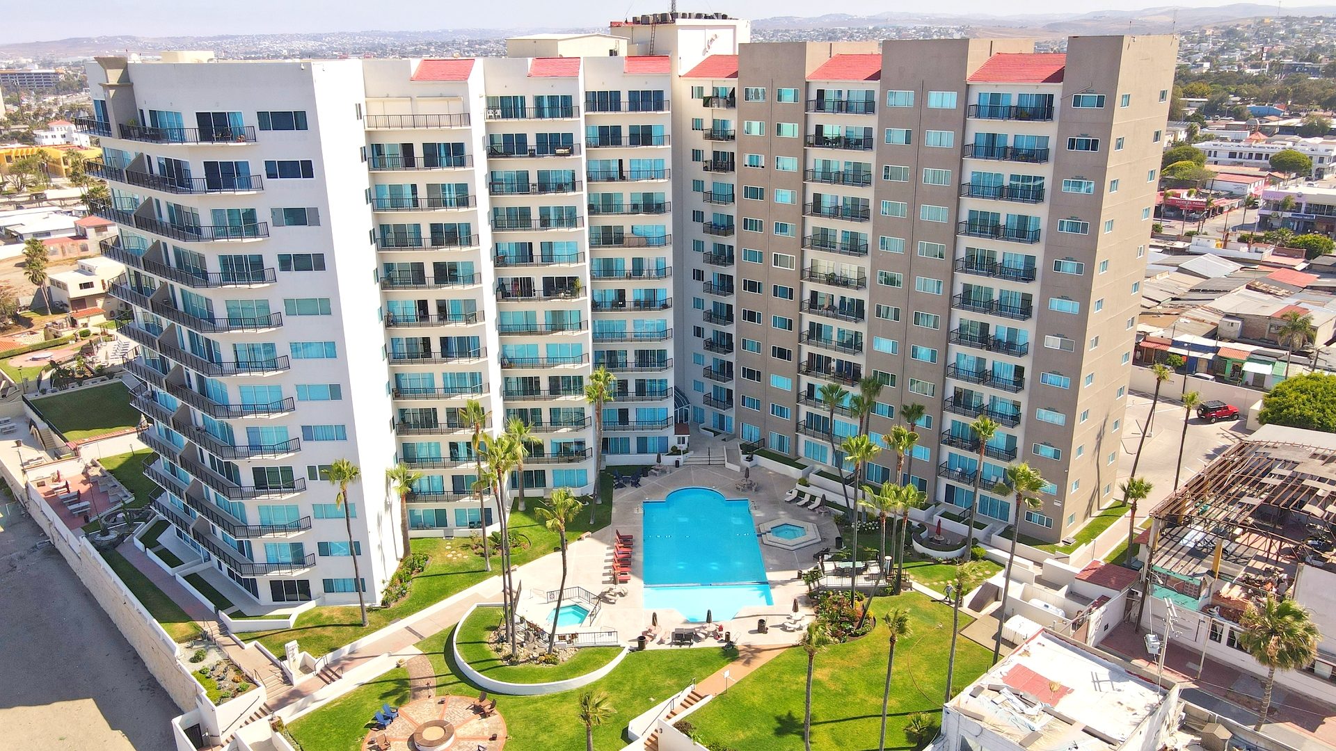 Infinity pool with Pacific Ocean views at luxury gated beachfront community Rosarito Beach