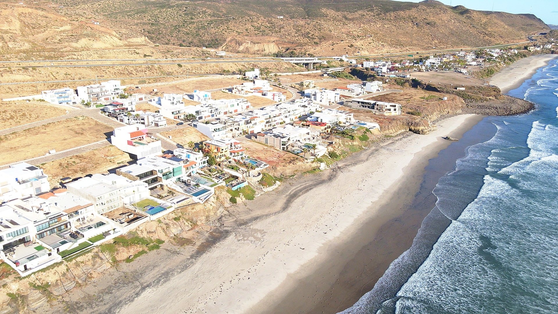 Security presence at a gated entrance, representing gated community protection in Rosarito