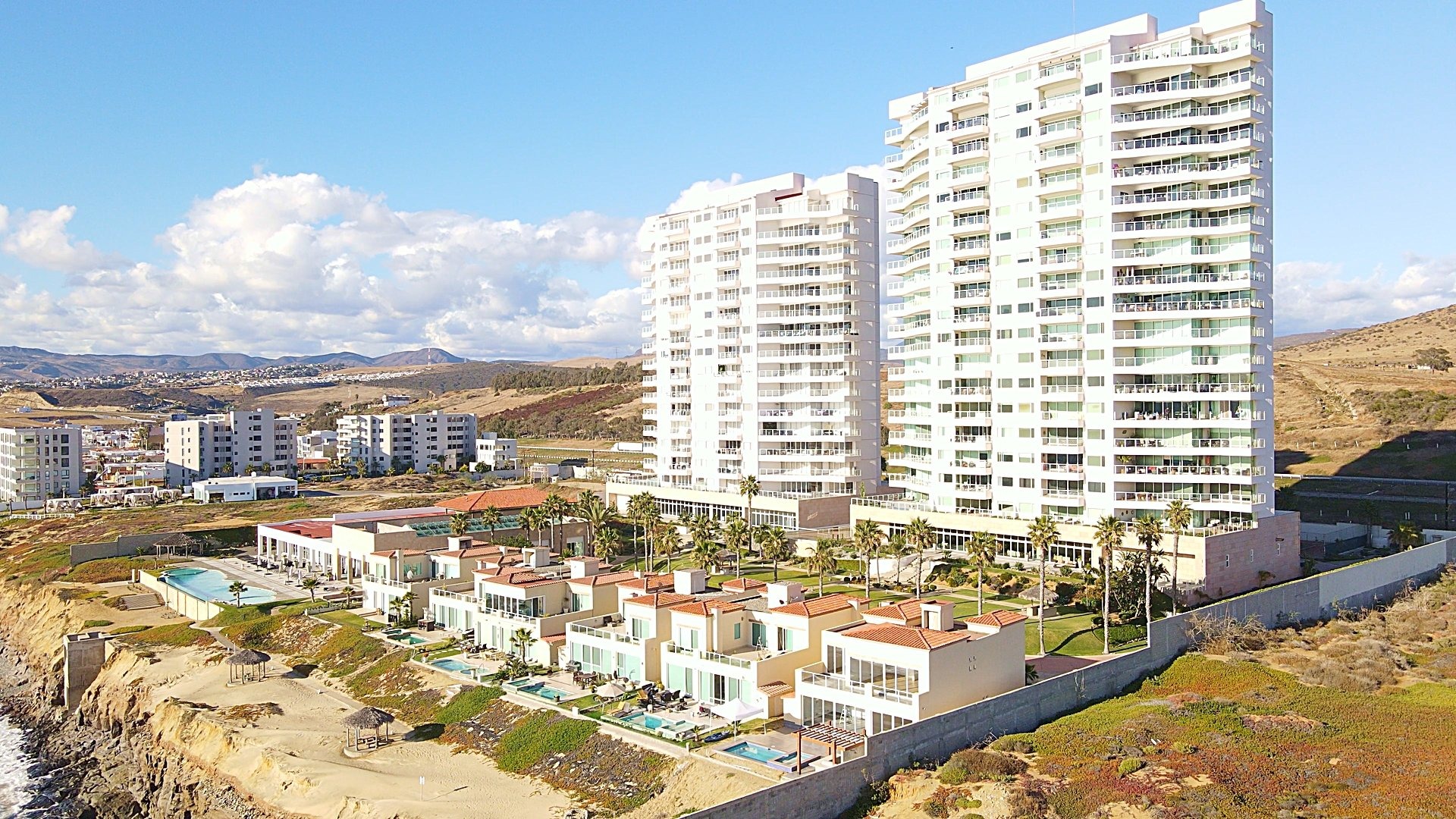 Quiet beachfront home setting with hammock and turquoise ocean south of Rosarito Beach