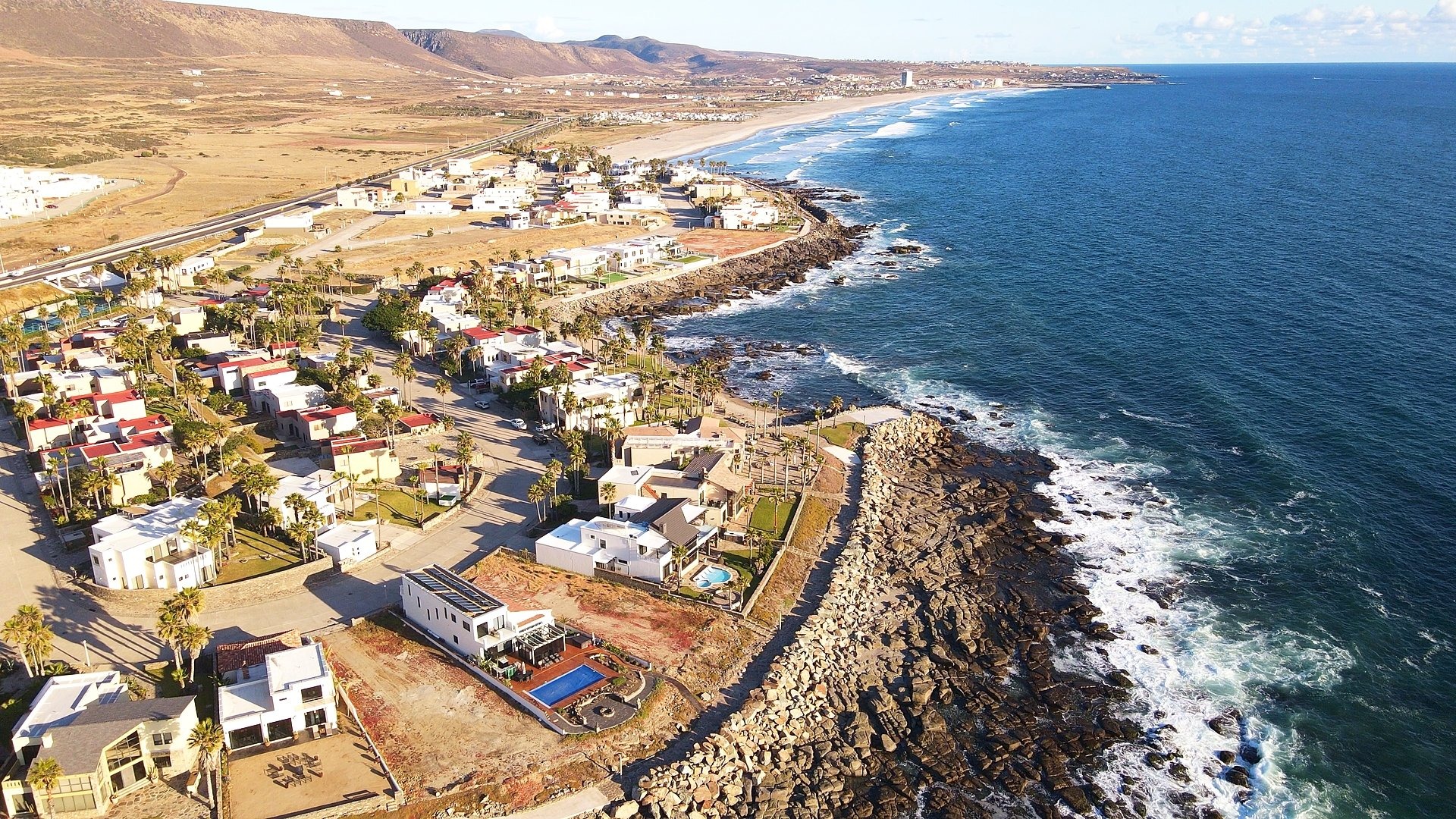 Undeveloped beachfront lot for sale in a gated beachfront community