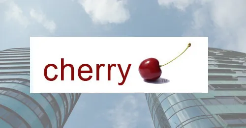 Cherry logo over two modern sky scrapers