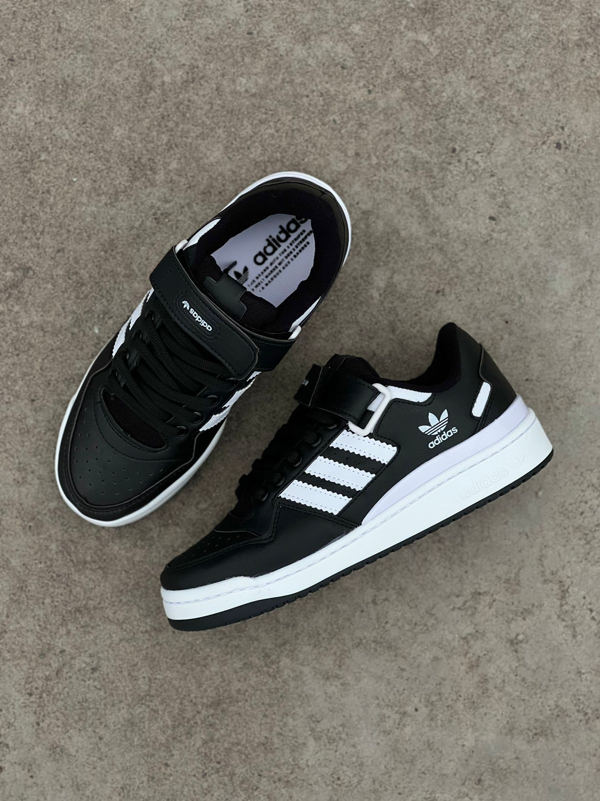 FORUM LOW ABROJO NEGRA BLANCA