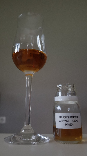 Photo of the rum Jamaican Rum OWH taken from user ...and a bottle of Rum.