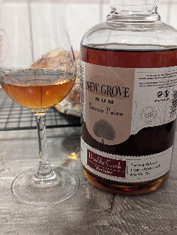 Photo of the rum New Grove Savoir Faire Double Cask Merisier taken from user Christian Rudt