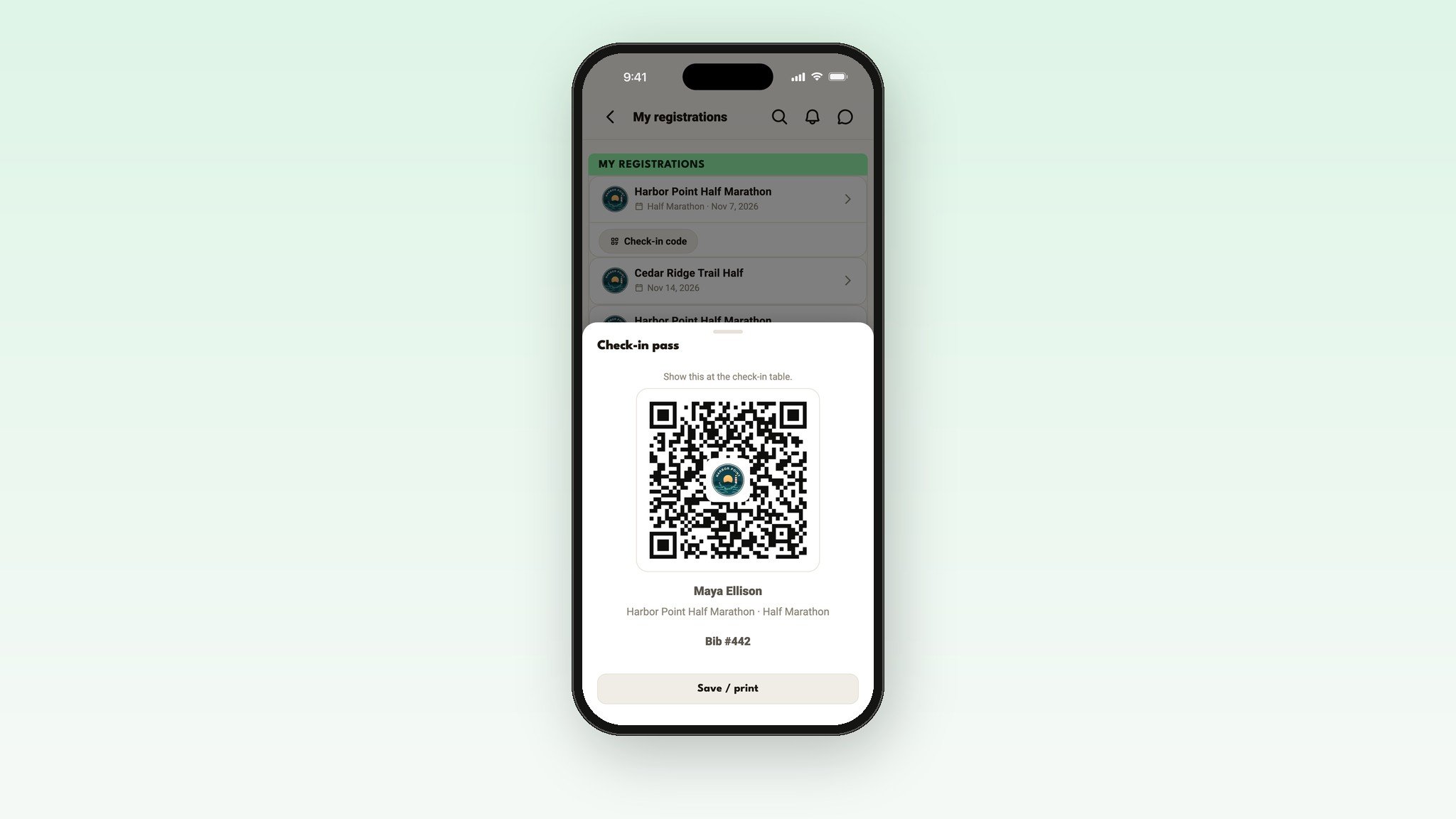 A runner's check-in pass with its QR code in the Run This app