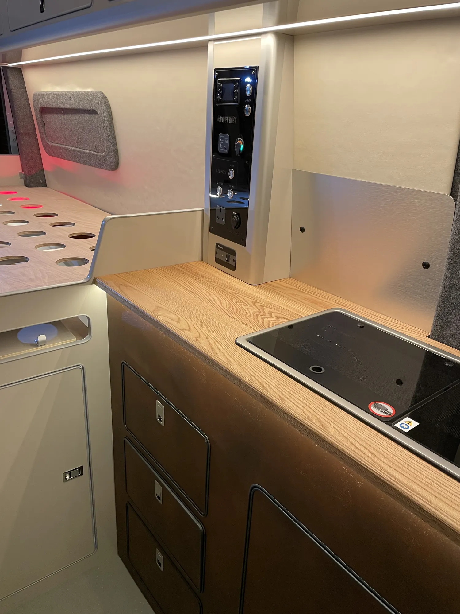 Galley worktop with induction hob and drawer stack in a MAN TGE conversion