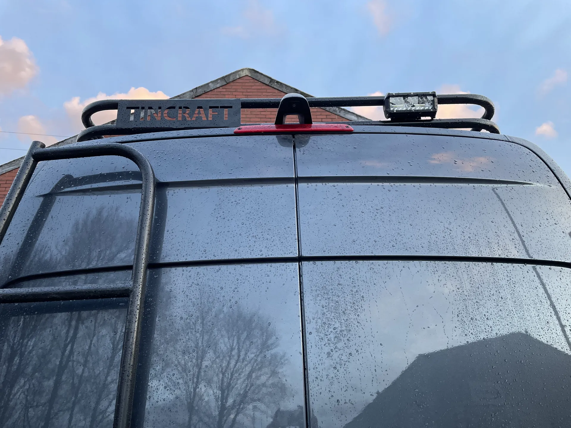 Tincraft name engraved into the roof rack of a Mercedes Sprinter conversion