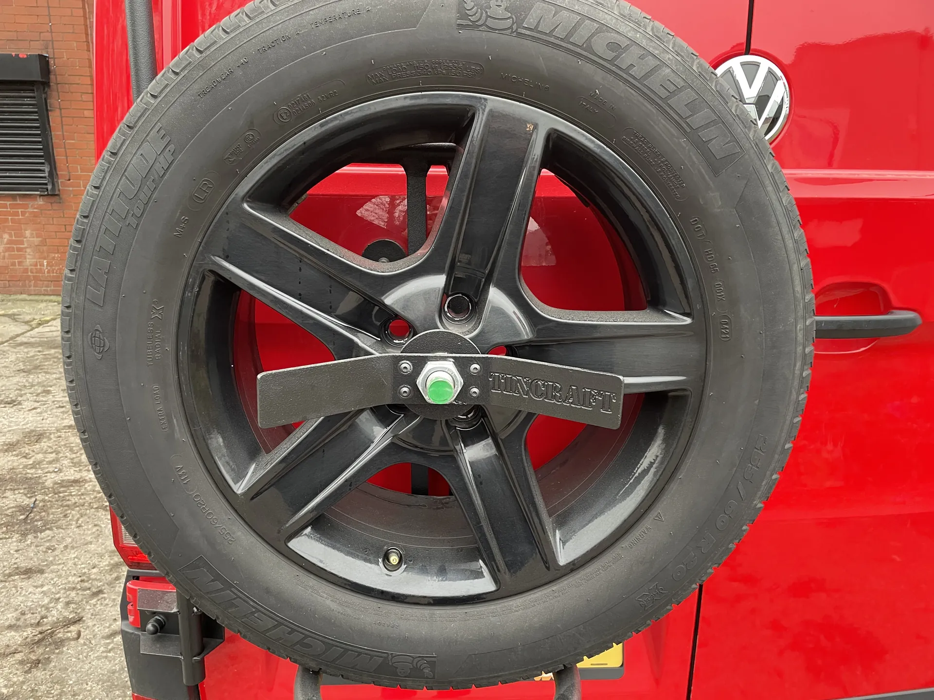 Alloy wheel with a red brake caliper on a VW Crafter camper conversion