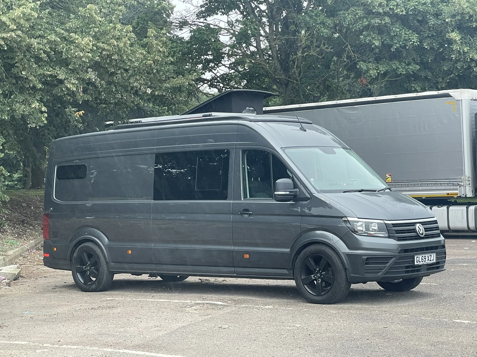 Grey VW Crafter campervan conversion, front three-quarter view