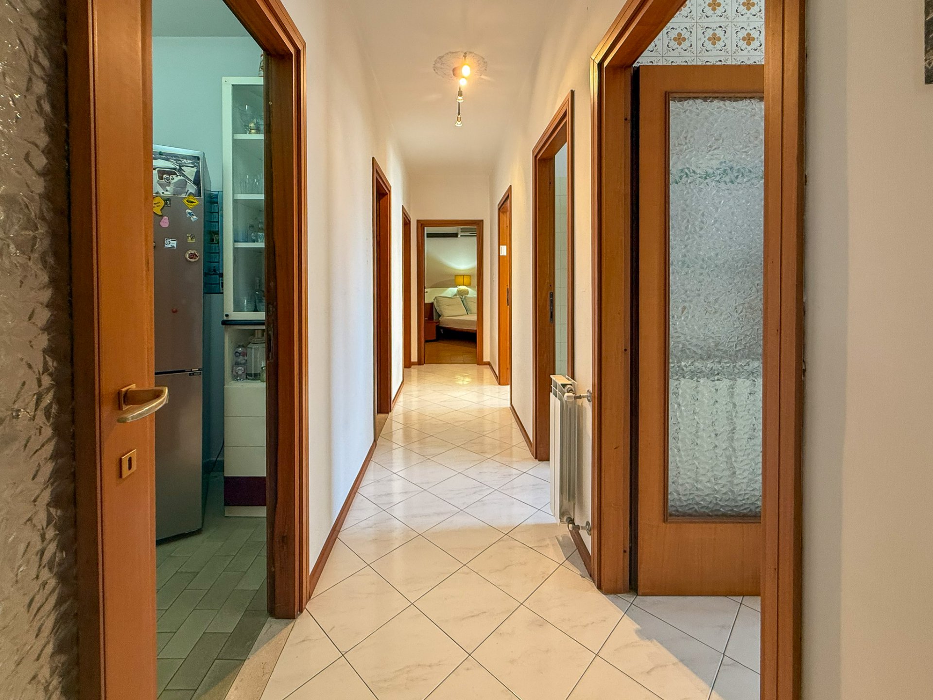 Amsicora ampio quadrilocale piano alto 10