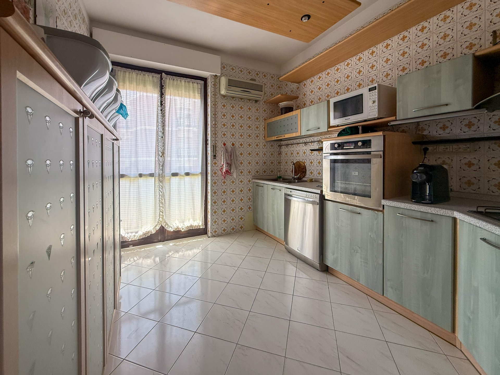 Amsicora ampio quadrilocale piano alto 11