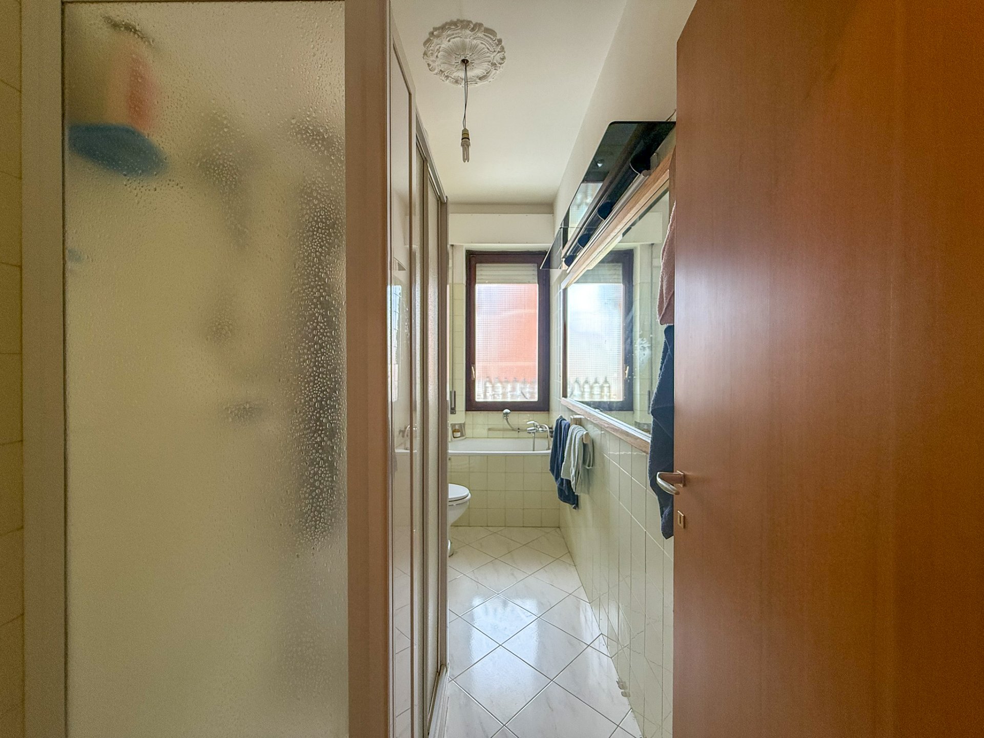 Amsicora ampio quadrilocale piano alto 12