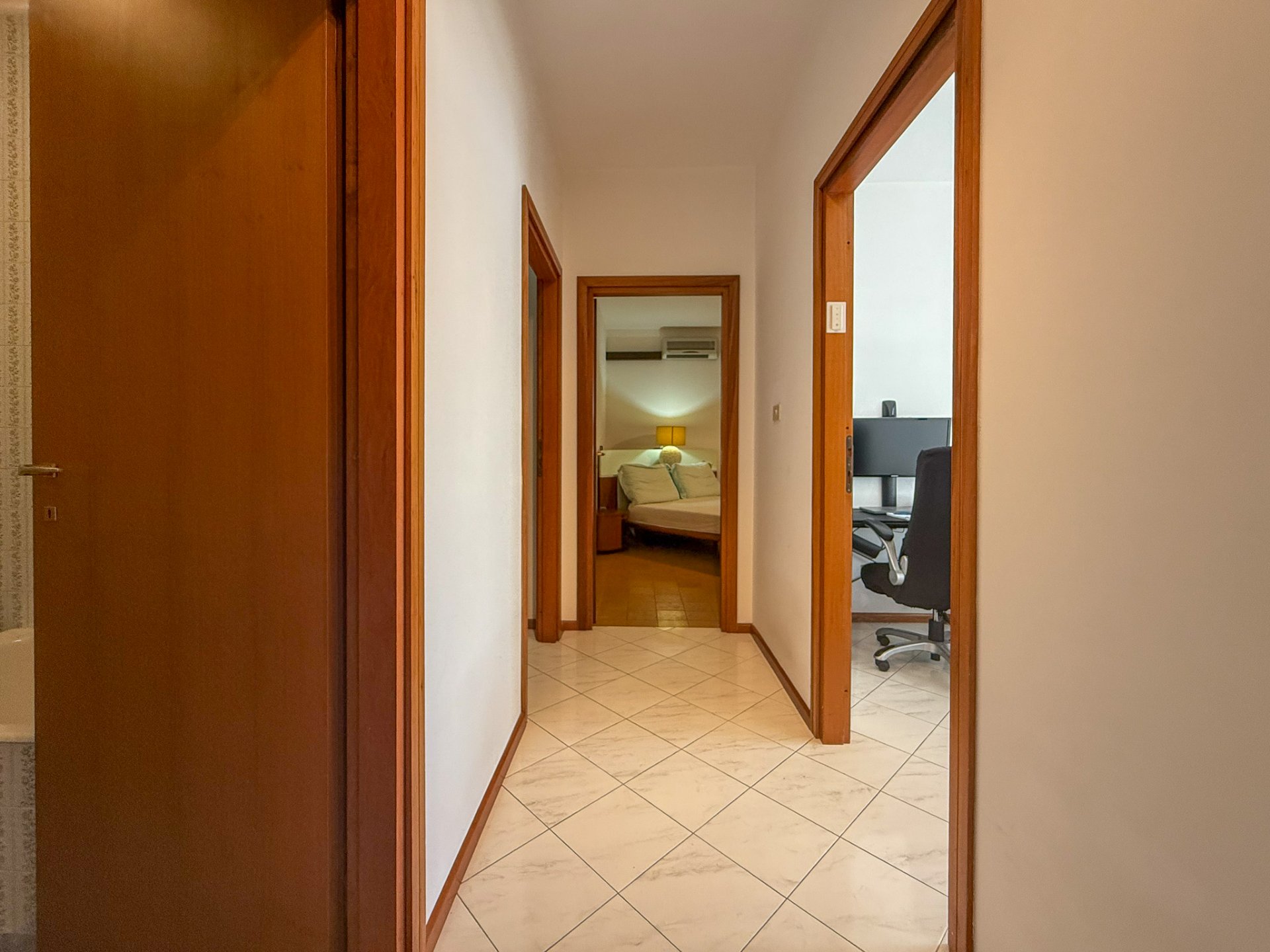 Amsicora ampio quadrilocale piano alto 14