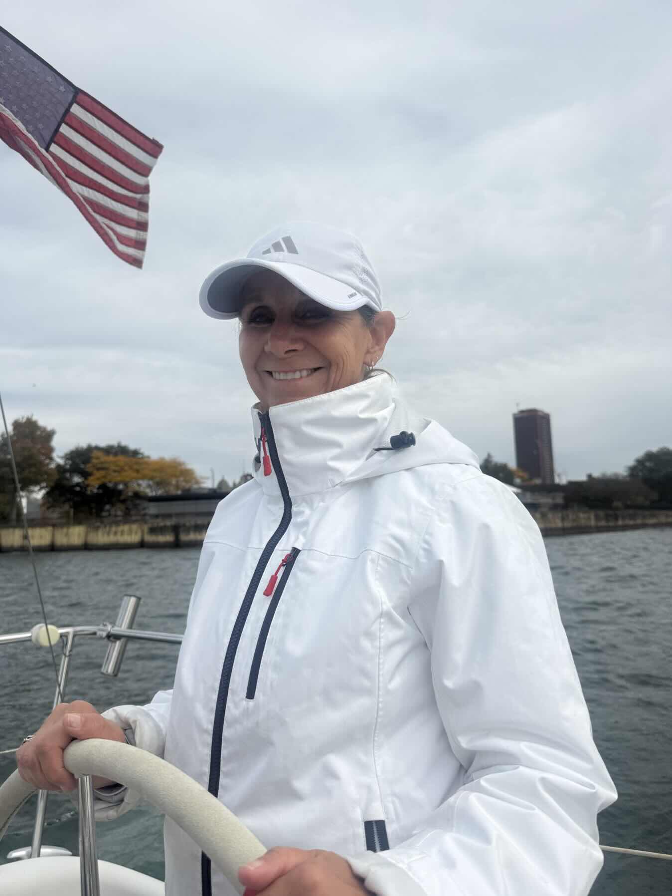 The Admiral on the Helm for a great fall sail_C0FDD1AF-1AF7-42D8-803E-34546DFE5762