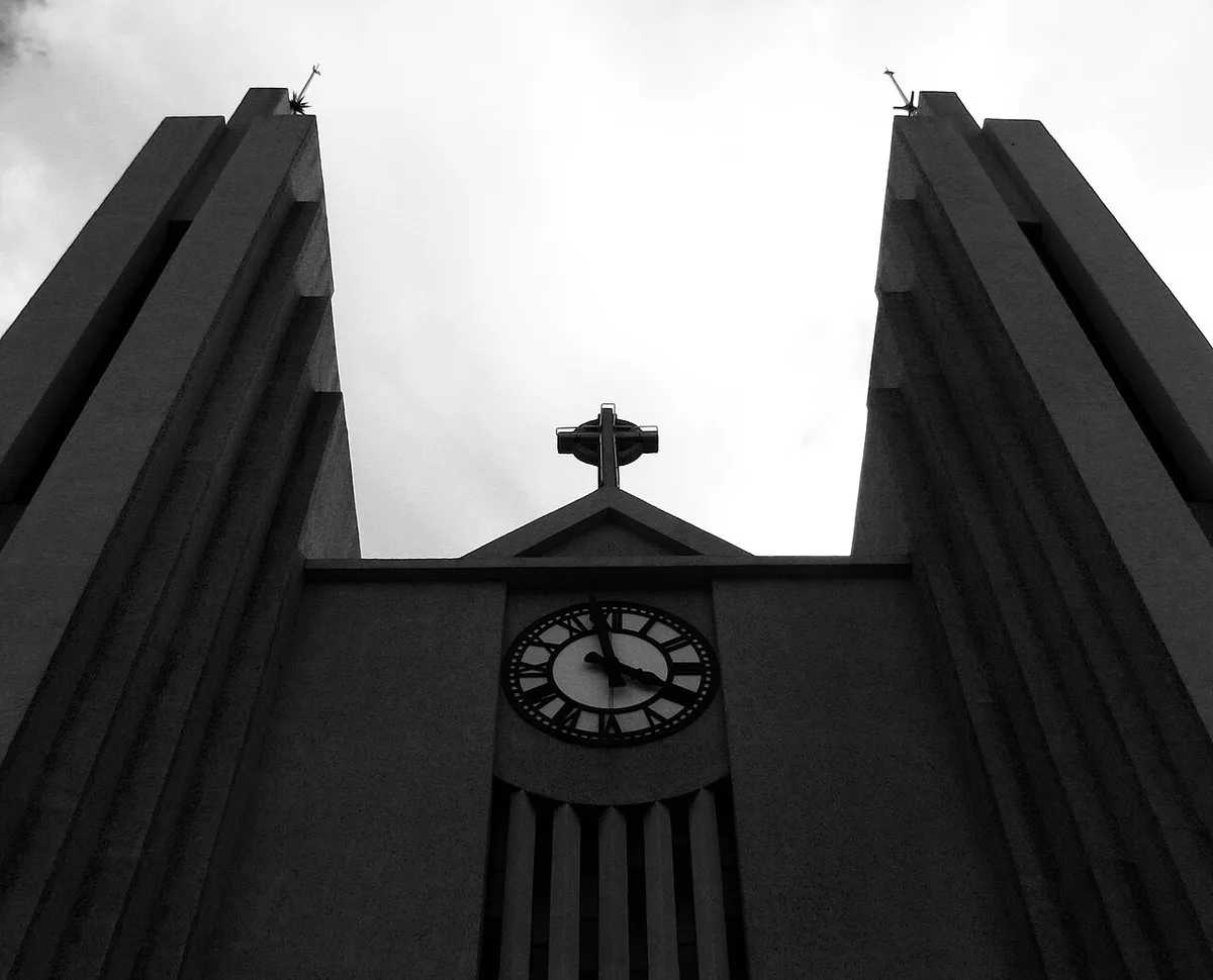 black and white, cross, Akureyri, Akureyrarkirkja, clock, christianity, religion, road trip, 2008-08 -- Iceland 1st Anniversary Trip