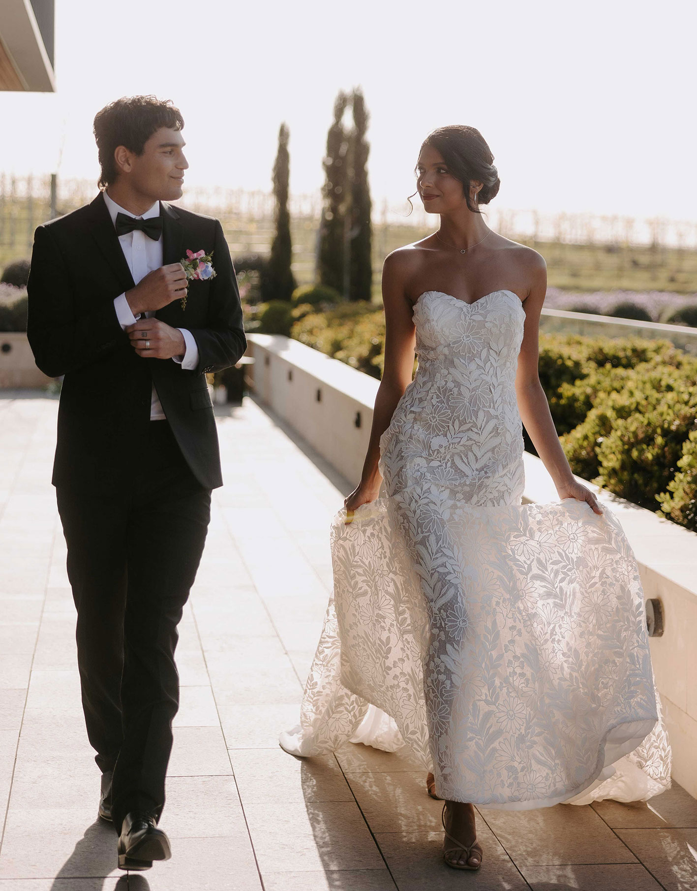 Solenne | Strapless Floral Lace Wedding Gown with a Flowing Train