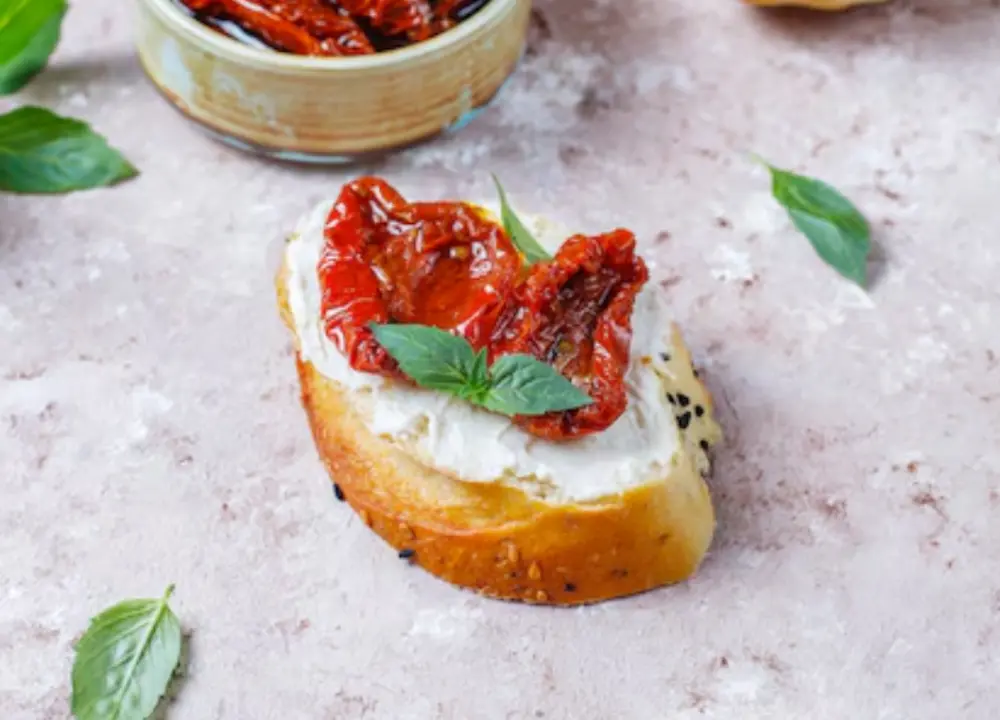 Bruschetta con pomodorini confit e burrata