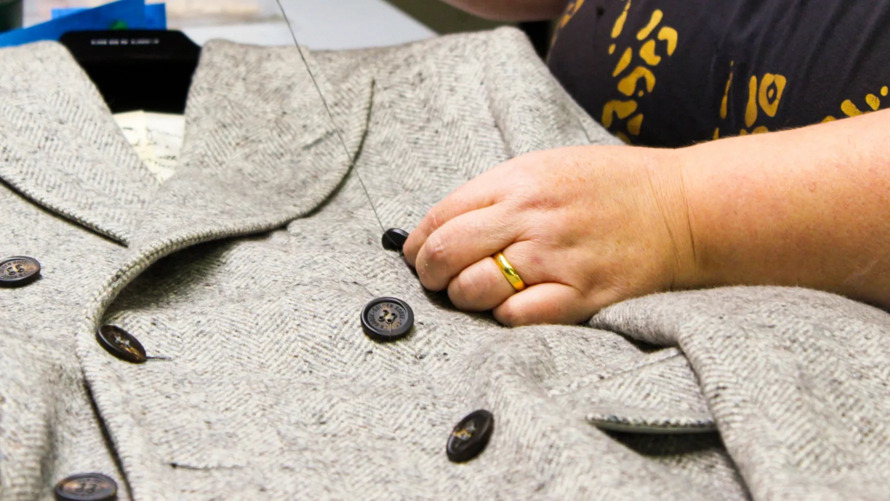 Attaccatura bottoni capospalla