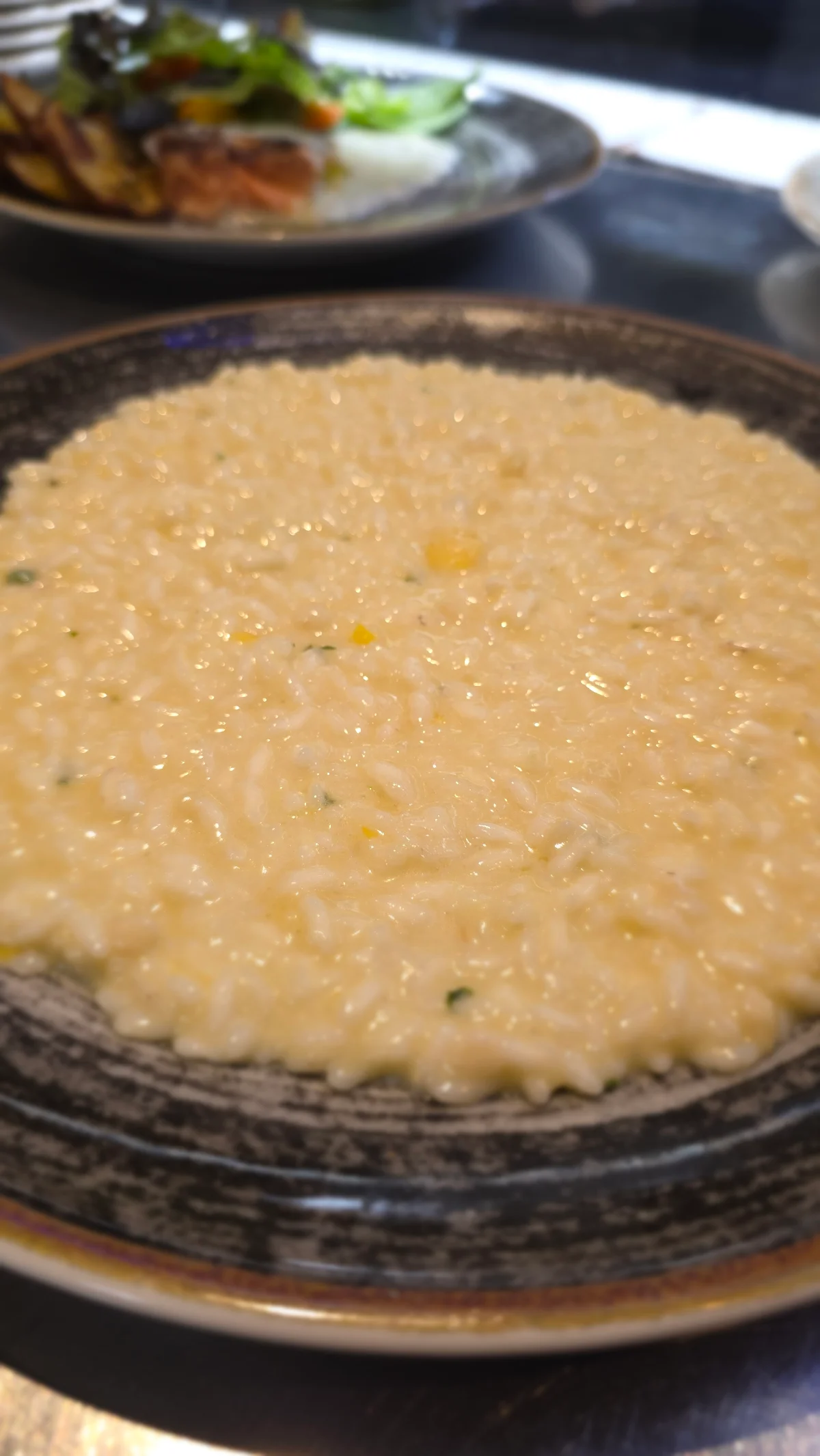 Risotto carnaroli con pesto di limone, mandorle e Grana Padano Dop