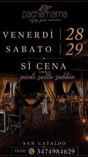 Sì cena con i piedi sulla sabbia