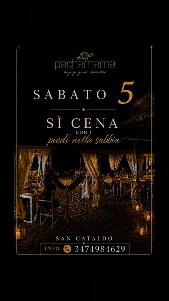 Sì cena con i piedi nella sabbia
