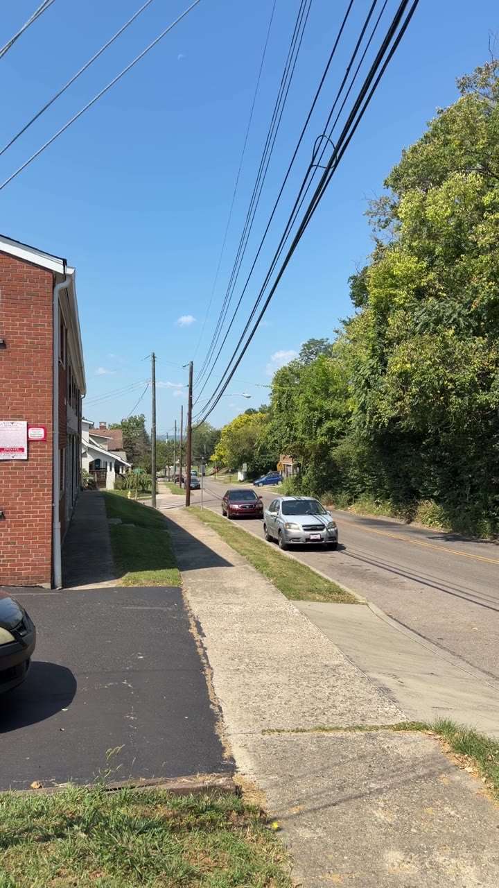 Sidewalk And Sloping Street, Norwood — United States