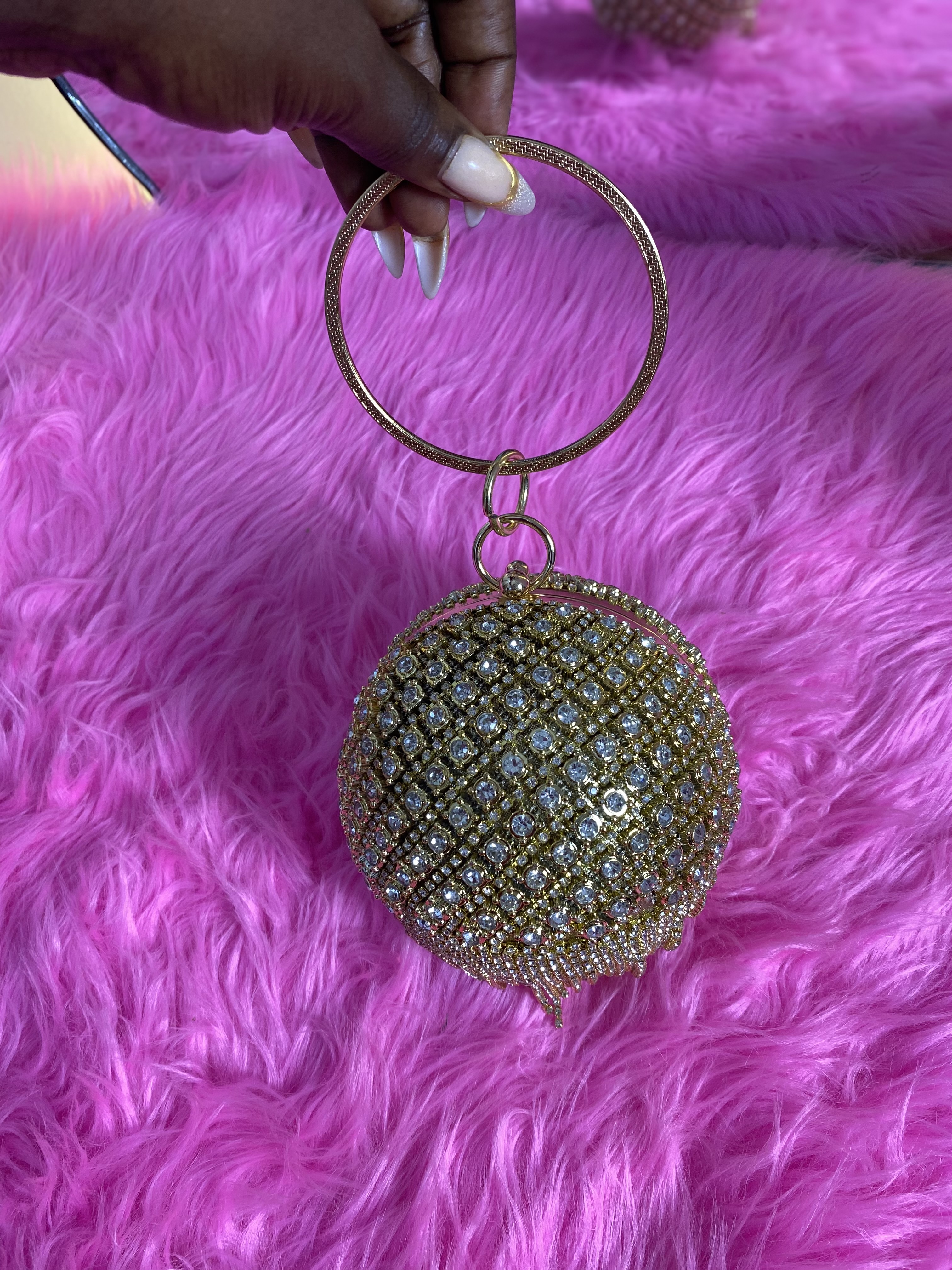 Gold round clutch 