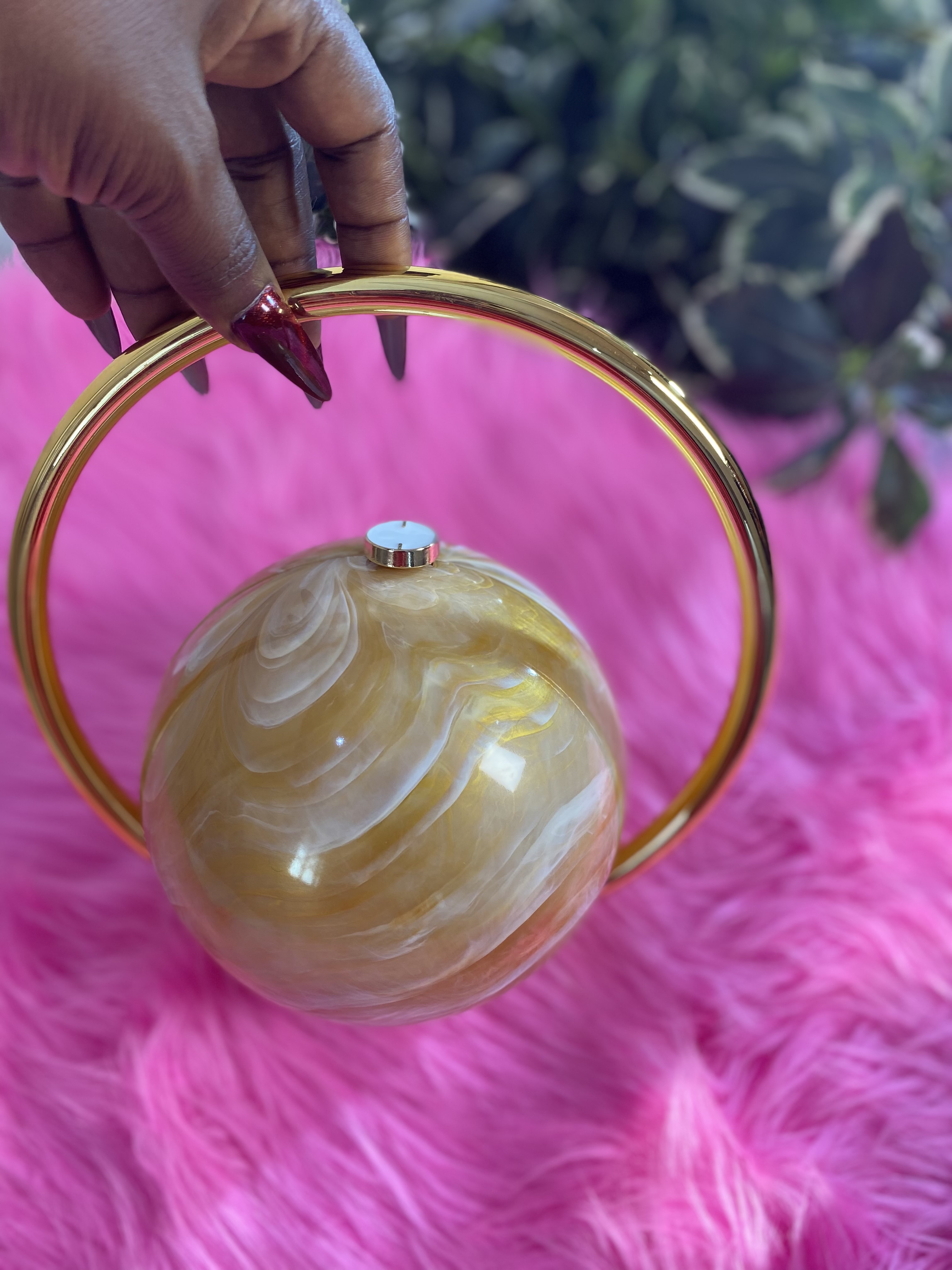 Yellow round clutch 
