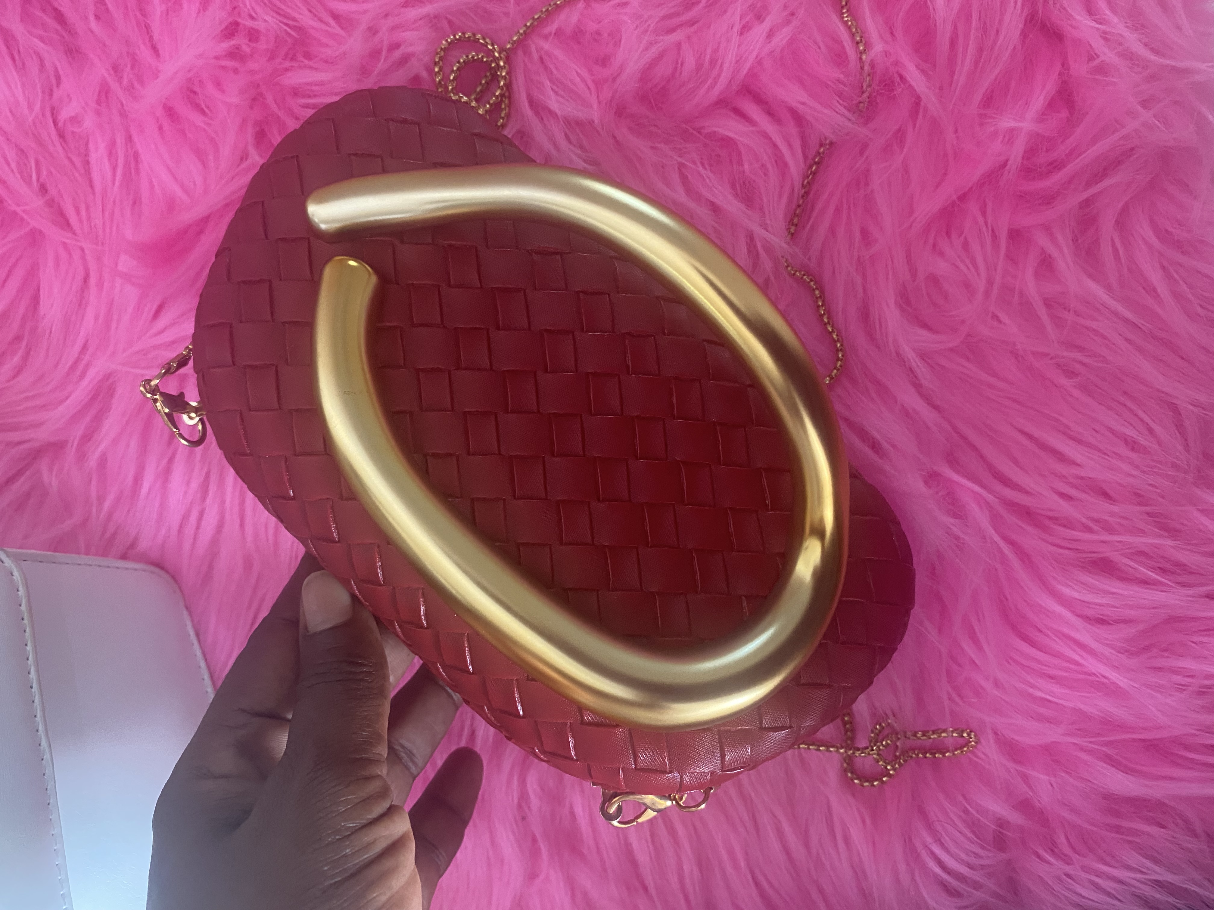 Red clutch in box 