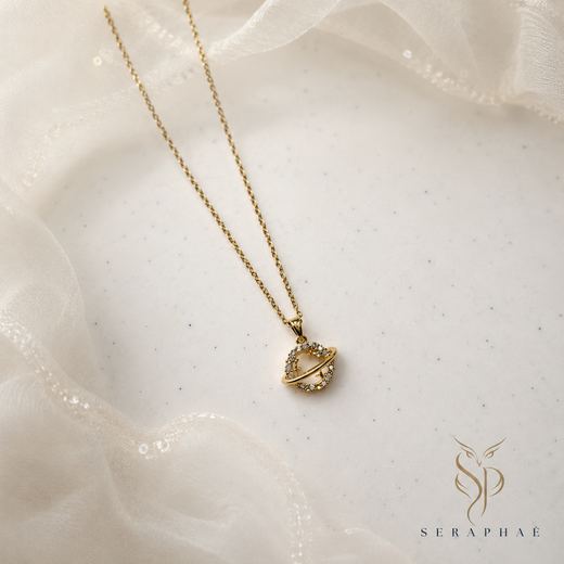 Celestial Saturn Pendant — 18k gold-plated · CZ