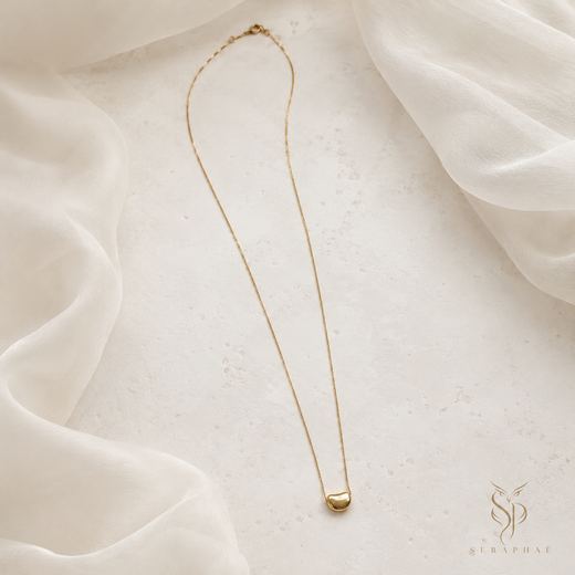 Golden Pebble Pendant — 18k gold-plated brass