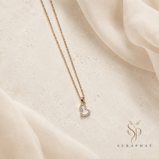 Crystal Heart Drop Pendant — 18k gold-plated · CZ