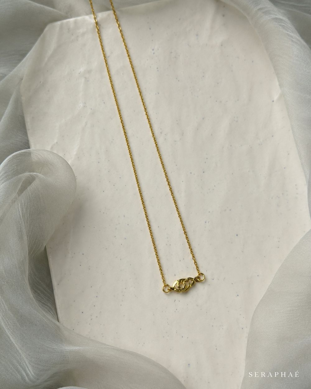 Twisted Knot Necklace — view 1