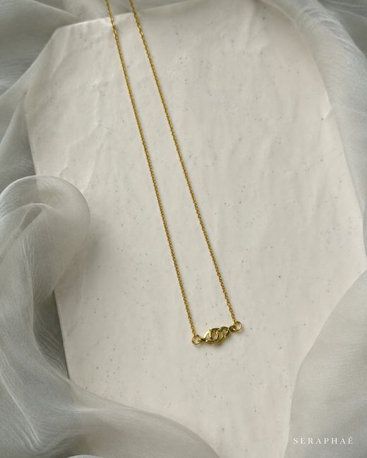 Twisted Knot Necklace — 18k gold-plated brass