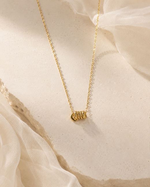 Golden Coil Bead Pendant — 18k gold-plated brass