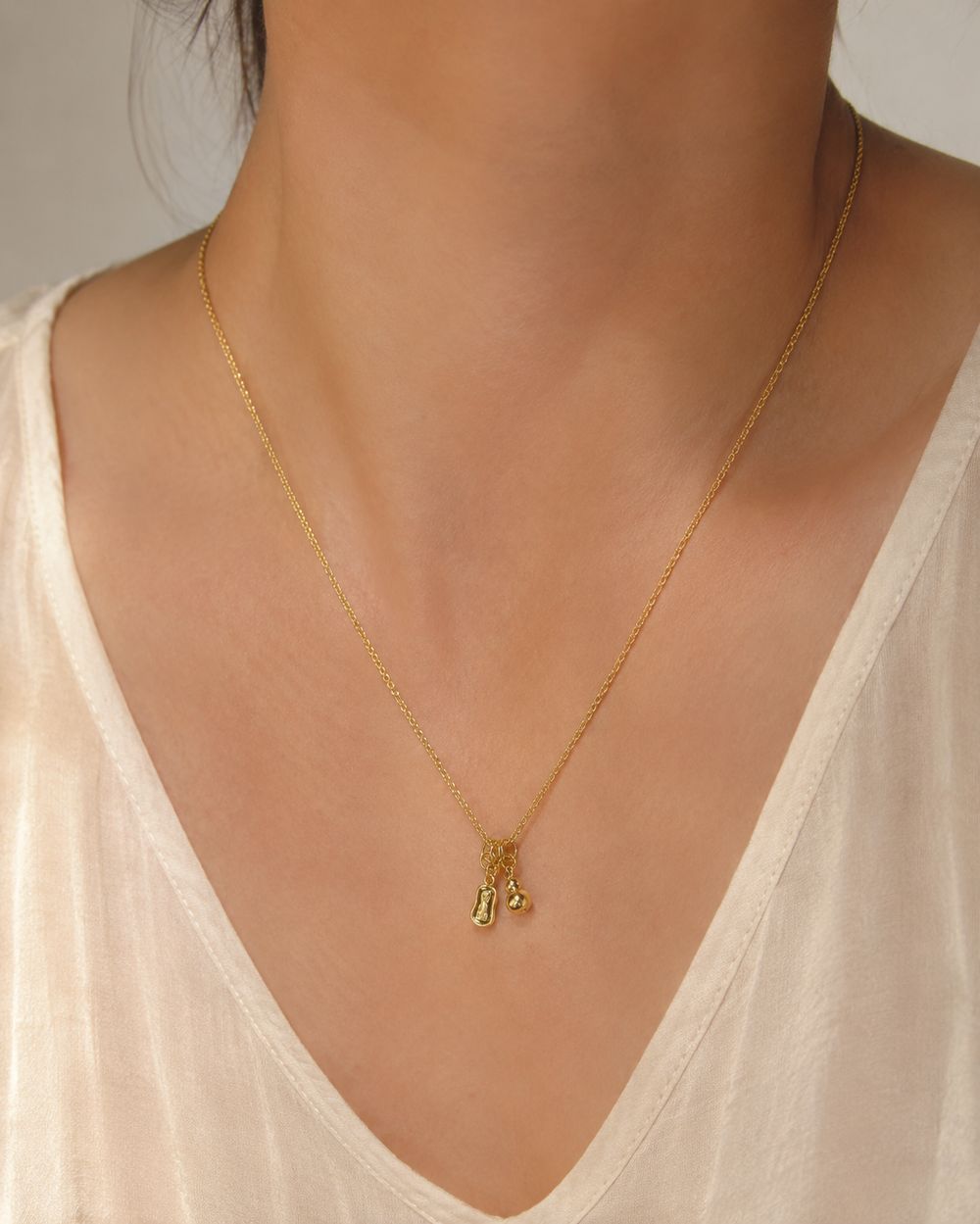 Golden Tassel Knot Pendant — view 2