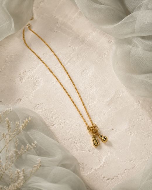 Golden Tassel Knot Pendant — 18k gold-plated brass