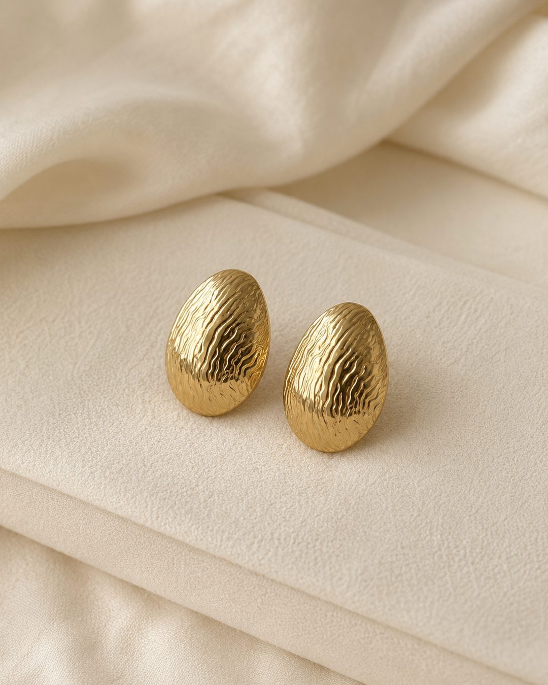 Gilded Teardrop Studs — 18k gold-plated · CZ