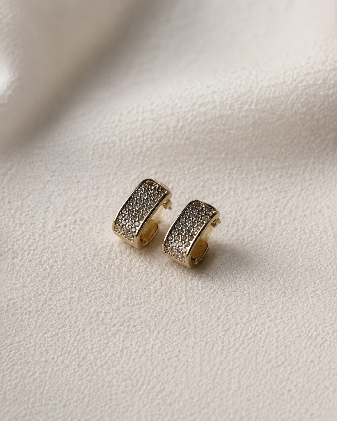 Pavé Huggie Hoops — 18k gold-plated · CZ