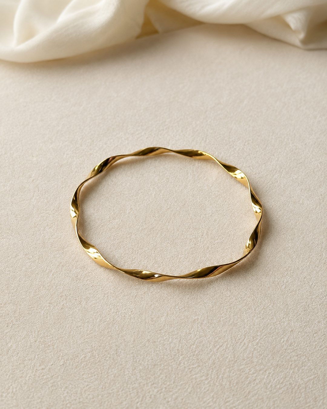 Twisted Rope Bangle — 18k gold-plated · CZ