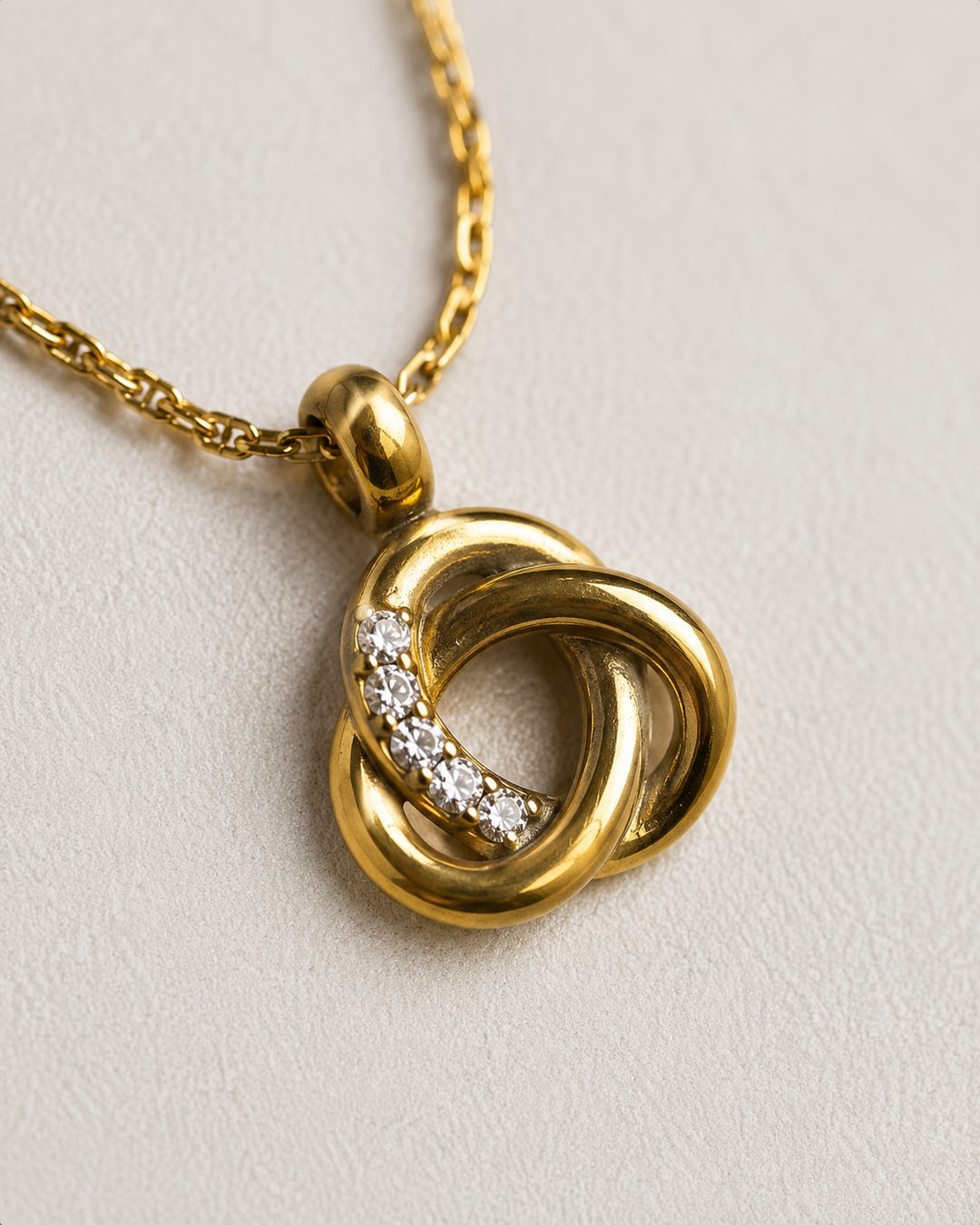 Love Knot Pendant — 18k gold-plated · CZ