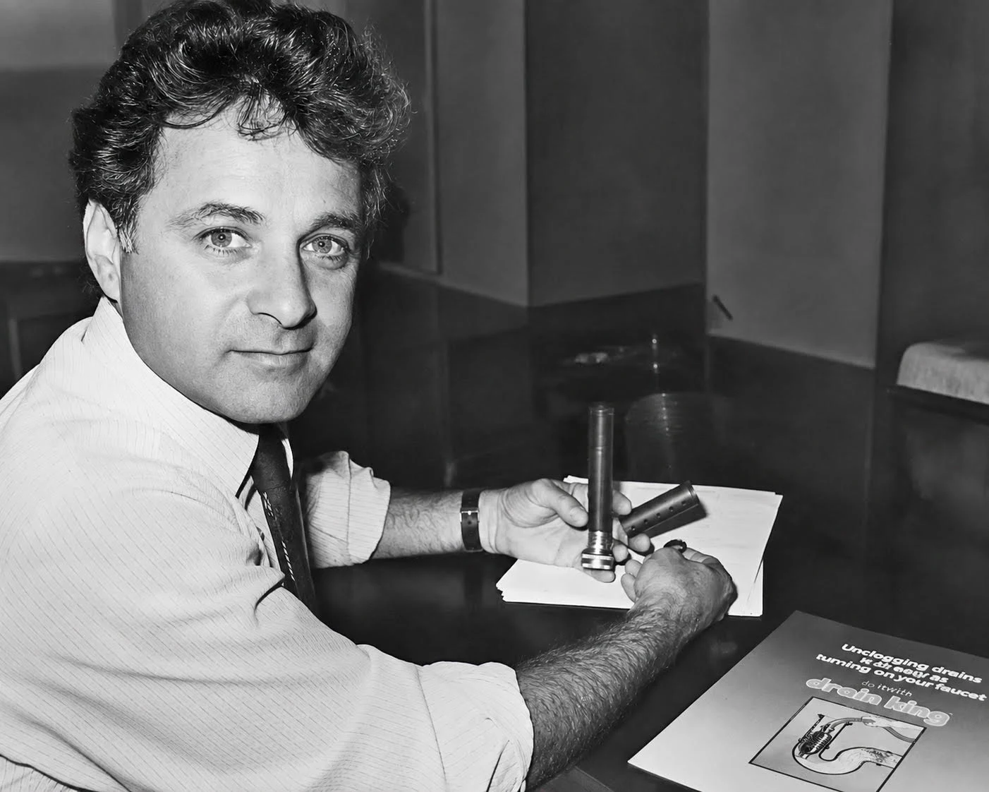 George Tash, founder of G.T. Water Products, with the original Drain King