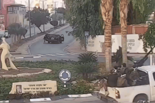 Footage of Hamas gunmen shooting a father as he tries to flee with his daughter under his arm on October 7, as Israel marks three years since the attack that killed 1,200 people and took 251 hostages.