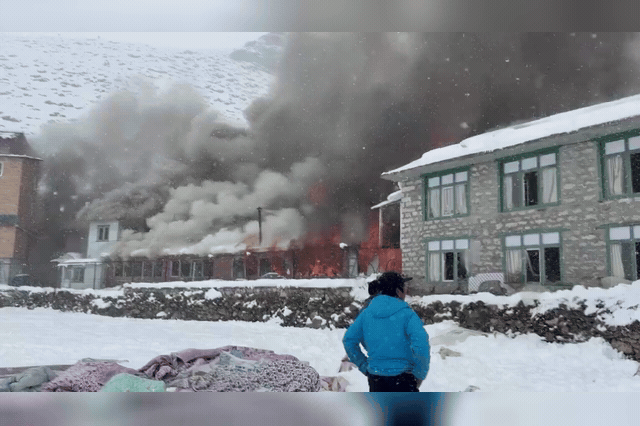 Flames engulf the Good Luck Hotel in Dingboche, Nepal, where gas cylinders stored in the kitchen made the blaze — which broke out at around 11am on Friday — extremely difficult to contain.
