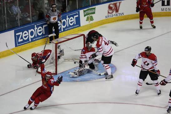 Russia and Canada players during an ice hockey match. The Court of Arbitration for Sport ruled on Friday that Russia must be readmitted to world championships, with the men's world junior championship in Canada the…