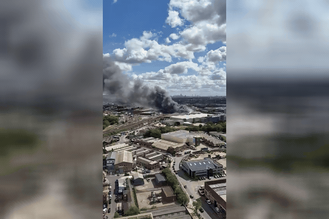 Firefighters tackle the blaze at the LondonEnergy Waste Transfer Station in Neasden, where more than 70 calls prompted the dispatch of 20 fire engines.