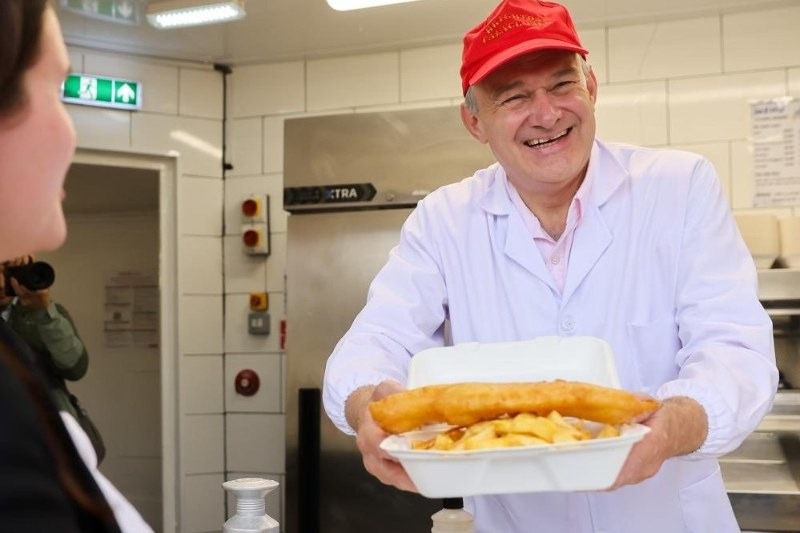 Ed Davey serving fish and chips in Brighton, as he demands a 10p-per-litre fuel duty cut, costed at around £2bn, to ease the cost-of-living crisis.