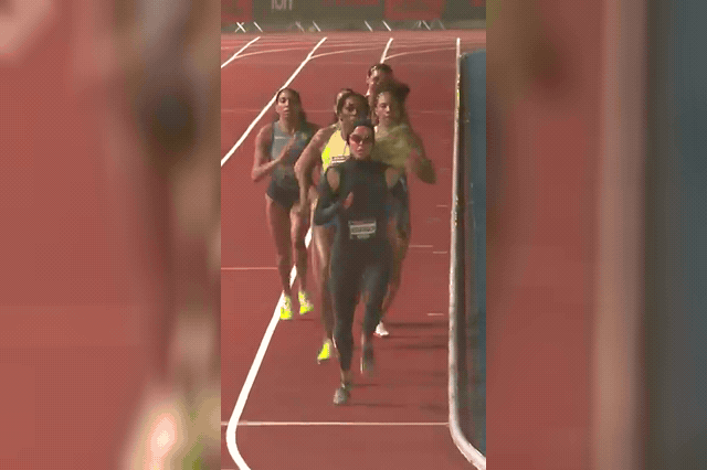 Female athletes race on an athletics track at the all-female Athlos event, which made its London debut at StoneX Stadium, with Keely Hodgkinson winning in a meet record of 1:56.40.