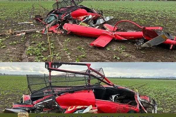 Wreckage of a helicopter in a field near McMinnville Municipal Airport, Oregon, where the National Transportation Safety Board is leading the investigation into what caused two helicopters to collide midair.