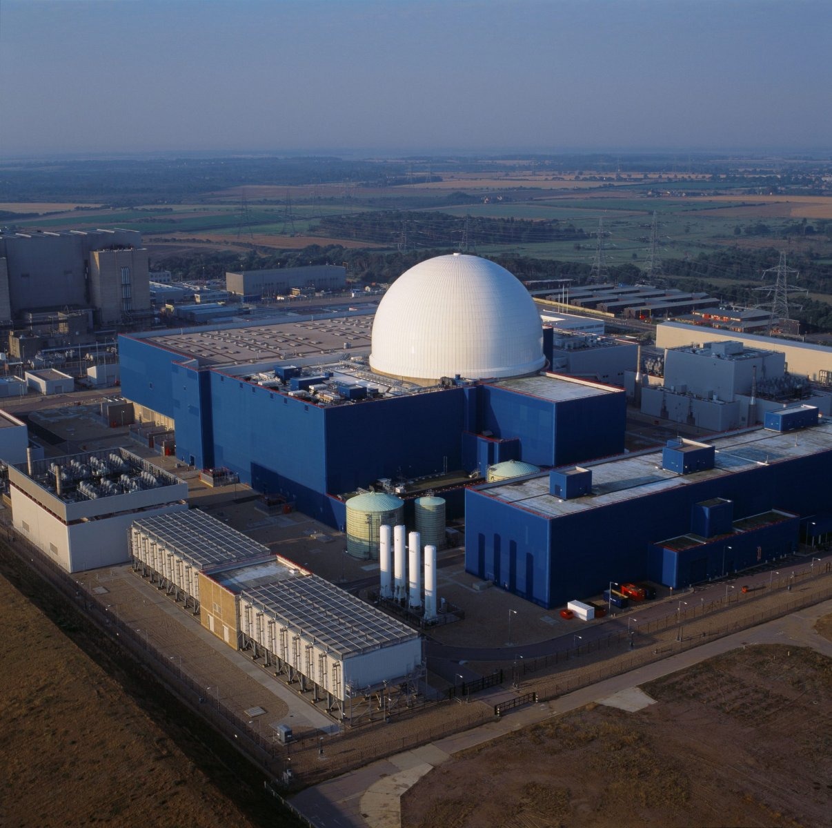 Private investors face contributing just £30m in overruns against £9.8bn from consumers, with no comparable nuclear station built on time and budget, MPs warn.